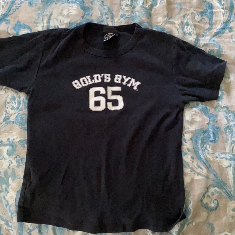3 black T-shirts.